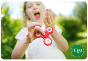 A child playing with an ADHD fidget toy