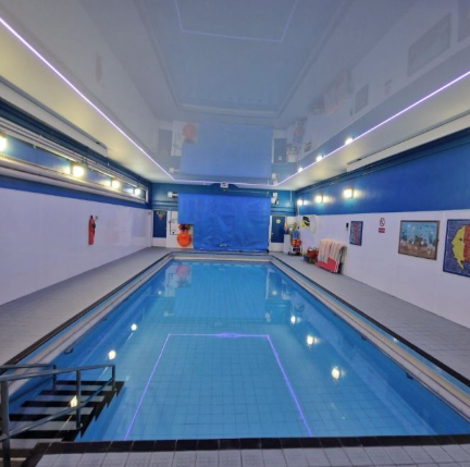 The swimming pool at Chesnut Lodge, with extended steps for accessible access