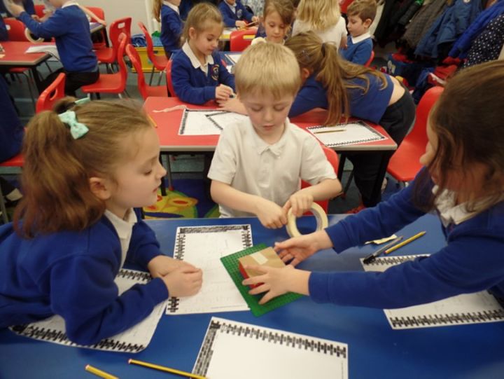 Children playing together whilst learning