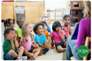 nursery aged children enjoying PSED with their school teacher, learning about mental health 