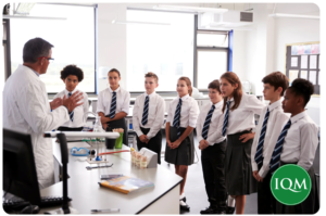 secondary school children engaging in a science lesson, looking at causes of mental health. 