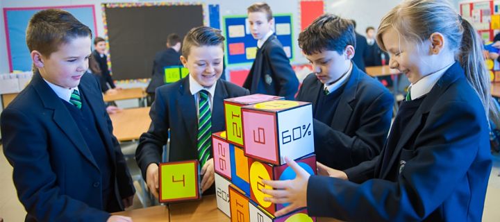 Pupils enjoying working together in a group