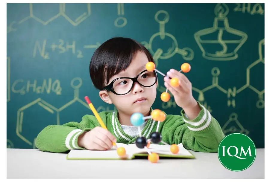 Young child using scientific learning aids